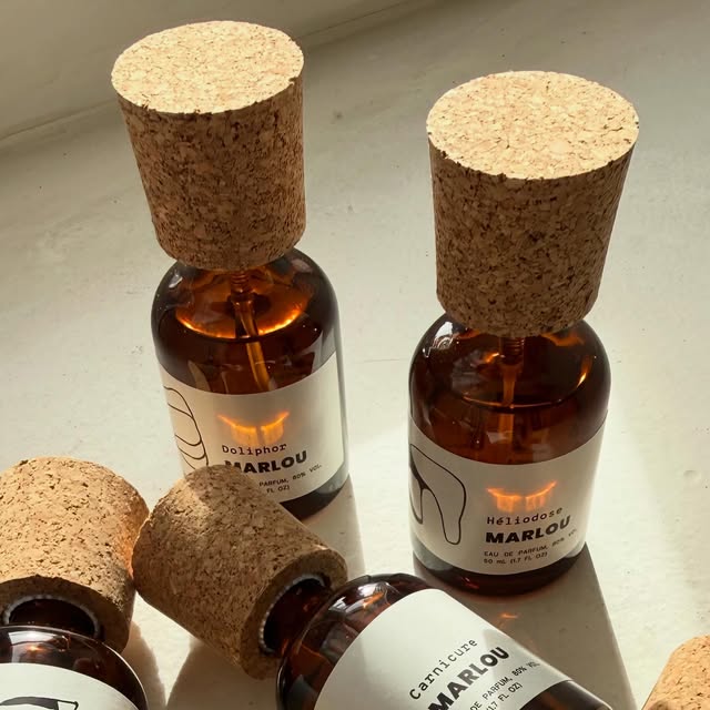 Marlou perfumes with cork caps in sunlight – latest Vetiveria Instagram post